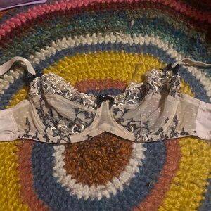 Lacy black and light pink bra